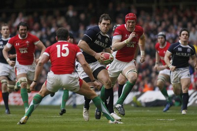13.02.10 Wales v Scotland - RBS 6 Nations -  Scotland's Sean Lamont takes on Wales' Lee Byrne. 