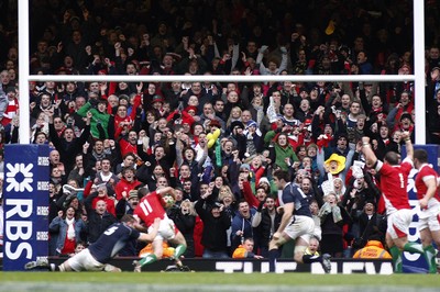 13.02.10 Wales v Scotland - RBS 6 Nations -  Wales supporters celebrate as Shane Williams(11) dives over in injury time to sneak an undeserved win. 