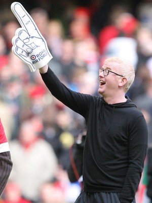13.02.10 Wales v Scotland... Radio 2 DJ Chris Evans points to the crowd while on the pitch of the Millennium Stadium during half time. .