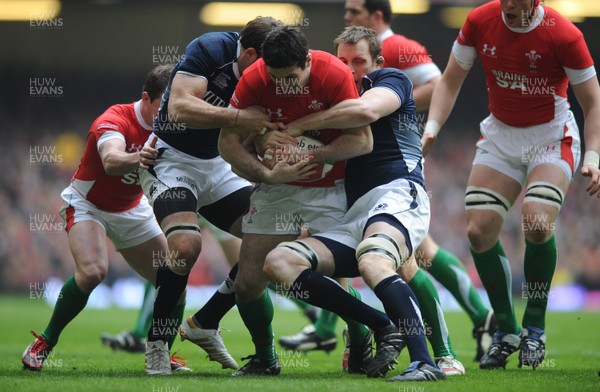13.02.10 - Wales v Scotland - RBS Six Nations 2010 - Stephen Jones of Wales takes on Sean Lamont and John Barclay of Scotland. 
