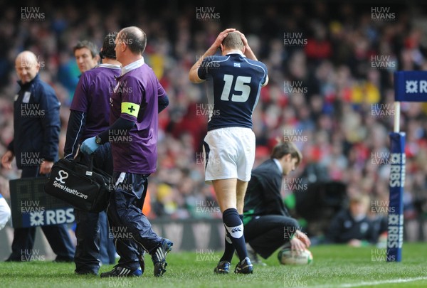 13.02.10 - Wales v Scotland - RBS Six Nations 2010 - Chris Paterson of Scotland leaves the field with an injury. 