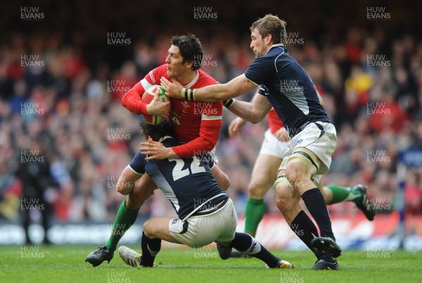 13.02.10 - Wales v Scotland - RBS Six Nations 2010 - James Hook of Wales is tackled by Max Evans of Scotland. 
