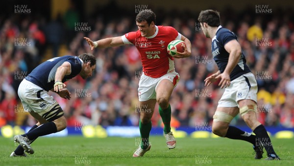 13.02.10 - Wales v Scotland - RBS Six Nations 2010 - Jamie Roberts of Wales holds off Graeme Morrison of Scotland. 