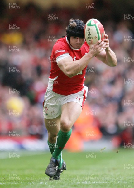 13.02.10 Wales v Scotland... Leigh Halfpenny sets off for his try. .