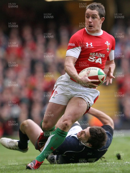 13.02.10 Wales v Scotland... Shane Williams takes on Dan Parks after beating Sean Lamont. .
