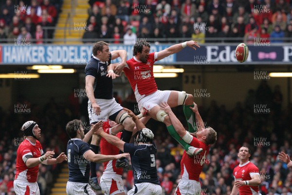 13.02.10 Wales v Scotland... Wales' Jonathan Thomas beats Scotland's Alastair Kellock to lineout ball. 