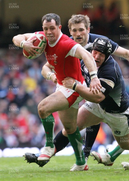 13.02.10 Wales v Scotland... Wales' Gareth Cooper is tackled by Scotland's Alasdair Dickinson. 