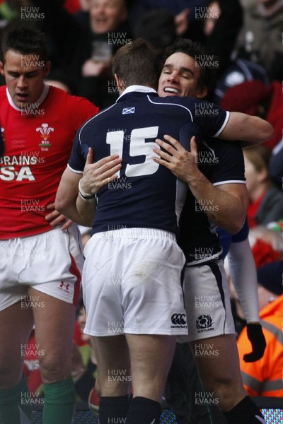 13.02.10 Wales v Scotland - RBS 6 Nations -  Scotland's second try scorer Thom Evans(R) is congratulated by team mate Chris Patterson 