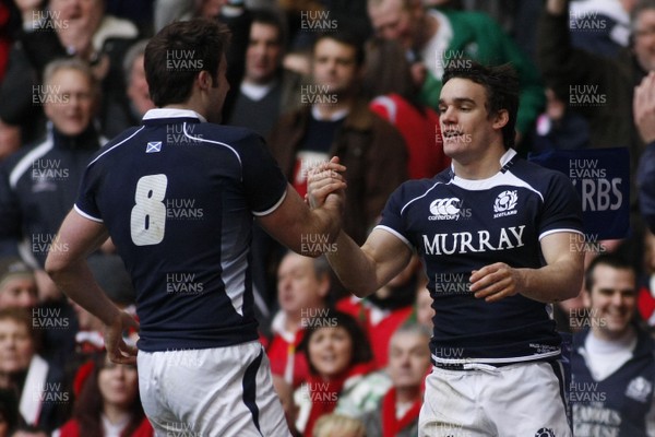 13.02.10 Wales v Scotland - RBS 6 Nations -  Scotland's try scorer Thom Evans(9) is congratulated by team-mate John Beattie. 