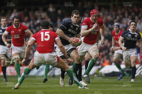 13.02.10 Wales v Scotland - RBS 6 Nations -  Scotland's Sean Lamont takes on Wales' Lee Byrne. 