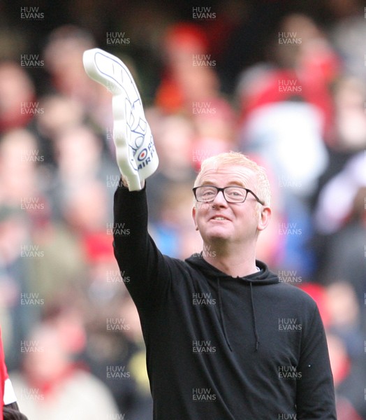 13.02.10 Wales v Scotland... Radio 2 DJ Chris Evans points to the crowd while on the pitch of the Millennium Stadium during half time. .