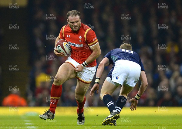 130216 - Wales v Scotland - RBS 6 Nations 2016 -Jamie Roberts of Wales takes on Finn Russell of Scotland