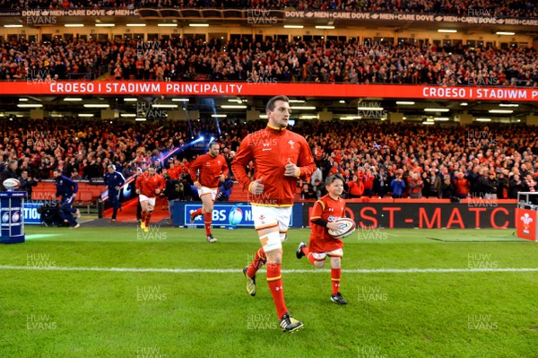 130216 - Wales v Scotland - RBS 6 Nations 2016 -Sam Warburton leads out his side with mascot