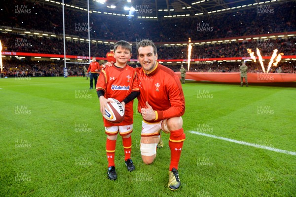 130216 - Wales v Scotland - RBS 6 Nations 2016 -Sam Warburton leads out his side with mascot