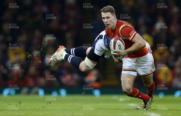 130216 - Wales v Scotland - RBS 6 Nations 2016 - Liam Williams of Wales is tackled by Tommy Seymour of Scotland