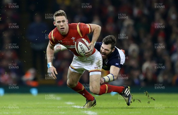 130216 - Wales v Scotland - RBS 6 Nations 2016 - Liam Williams of Wales is tackled by Tommy Seymour of Scotland