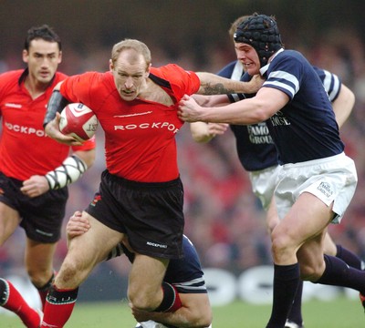 14-02-04. Wales v Scotland RBS Six Nations. Wales' Gareth Thomas is caught by Tom Philip  Pic: James Davies/