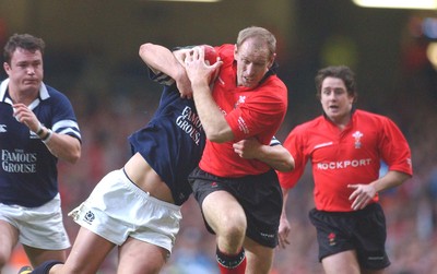 14.02.04  Wales v Scotland  Gareth Thomas is tackled by Ben Hinshelwood  Huw Evans,Cardiff