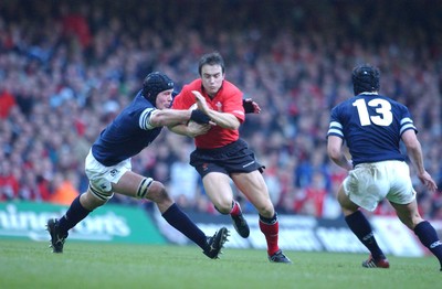 14.02.04  Wales v Scotland  Wales Rhys Williams takes on Stuart Grimes and Tom Philip(rt)  Huw Evans,Cardiff