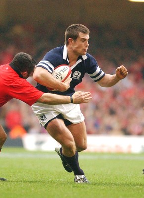 14-02-04. Wales v Scotland RBS Six Nations. Scotland's Ben Hinshelwood takes on Mefin Davies.   