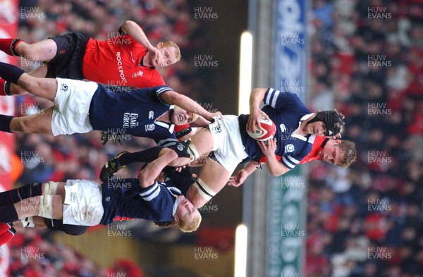 14.02.04  Wales v Scotland  Simon Taylor beats Dafydd James to the ball  Huw Evans,Cardiff