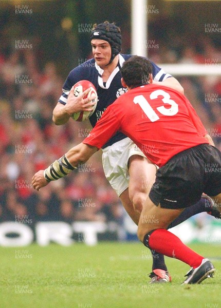 14-02-04. Wales v Scotland RBS Six Nations. Scotland's Andrew Henderson takes on Sonny Parker   