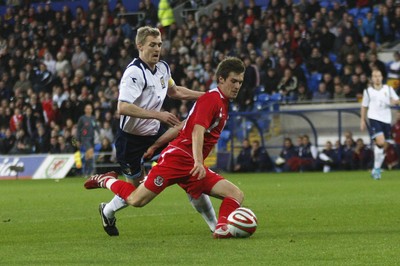 14.11.09  Wales v Scotland - International Football friendly - Wales' Aaron Ramsey fends off Darren Fletcher to score. 