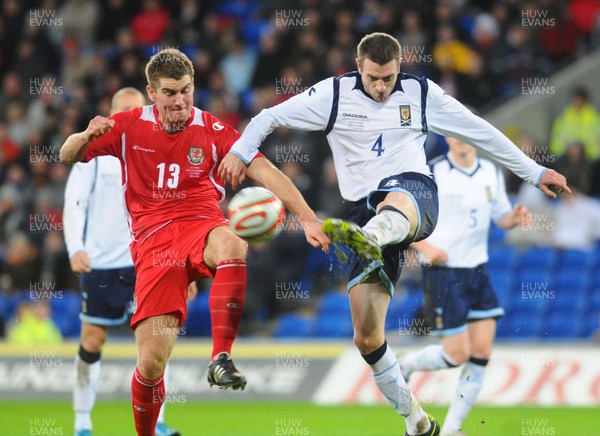 14.11.09 - International Football Friendly, Wales v Scotland Wales' Sam Vokes and Scotland's Stephen McManus compete 