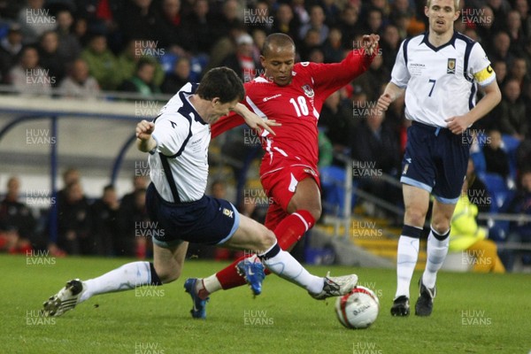 14.11.09  Wales v Scotland - International Football friendly - Wales' Robert Earnshaw battles for the ball with Gary Caldwell. 