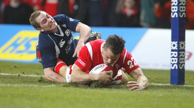12.02.06..Wales v Scotland, Millennium Stadium, Cardiff Wales' Lee Byrne beats Dan Parks tackle to cross the line, but the try is dis-allowed 