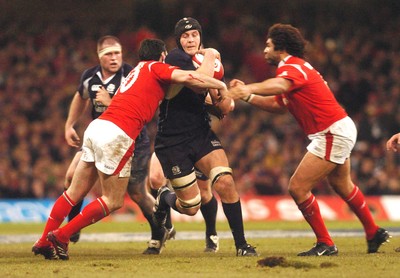 12.02.06 - Six Nations Rugby - Wales v Scotland Scotland's Alaistair Kellock tries to get between Spephen Jones and Colin Charvis 