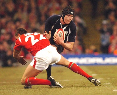 12.02.06 - Six Nations Rugby - Wales v Scotland Scotland's Alastair Kellock tries to get past Lee Byrne 