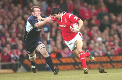 12.02.06  Wales v Scotland  Mike Phillips hands of Jon Petrie  