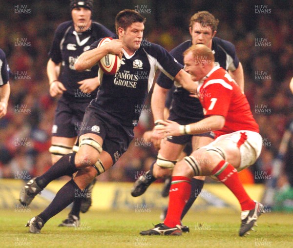 12.02.06 - Six Nations Rugby - Wales v Scotland Scotland's Allister Hogg tries to get past Martyn Williams 