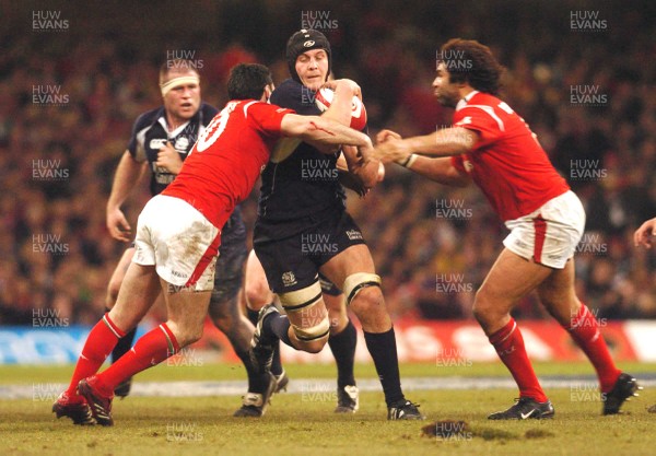 12.02.06 - Six Nations Rugby - Wales v Scotland Scotland's Alaistair Kellock tries to get between Spephen Jones and Colin Charvis 