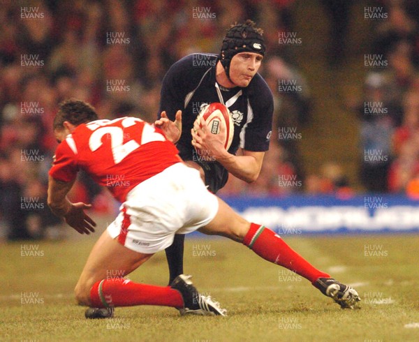 12.02.06 - Six Nations Rugby - Wales v Scotland Scotland's Alastair Kellock tries to get past Lee Byrne 