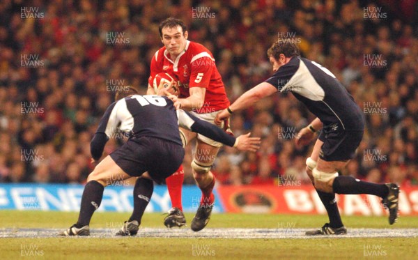 12.02.06 - Six Nations Rugby - Wales v Scotland Wales' Rob Sidoli tries to beat Ross Ford and Jason White 