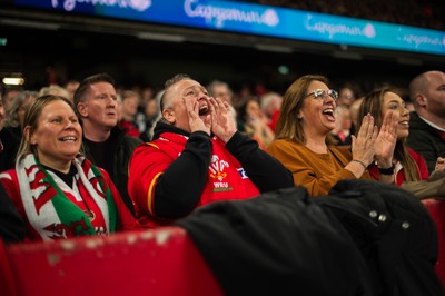 210226 - Wales v Scotland - Guinness Six Nations - Fans react inside the Stadium during the match 