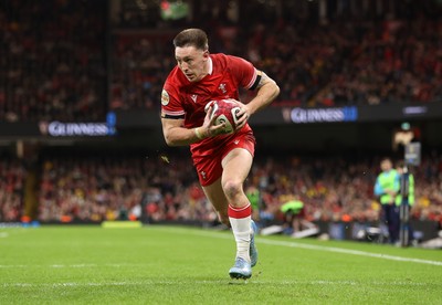 210226 - Wales v Scotland - Guinness Six Nations Championship - Josh Adams of Wales runs in to score a try