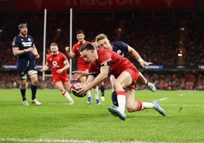 210226 - Wales v Scotland - Guinness Six Nations Championship - Josh Adams of Wales runs in to score a try
