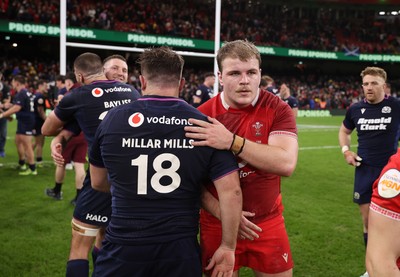 210226 - Wales v Scotland - Guinness Six Nations Championship - Archie Griffin of Wales shakes hands with the opposition at full time