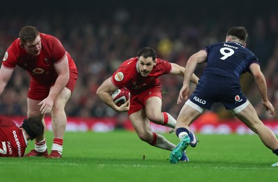 210226 - Wales v Scotland, 2026 Guinness Six Nations - Tomos Williams of Wales takes on Ben White of Scotland