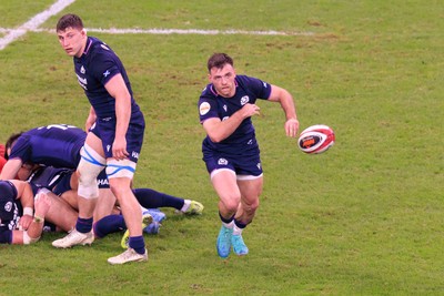 210226 - Wales v Scotland - Guinness Six Nations - Ben White of Scotland passes the ball