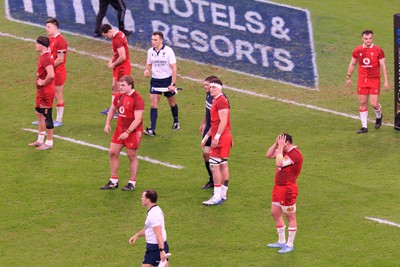 210226 - Wales v Scotland - Guinness Six Nations - Wales players dejected at the end of the match