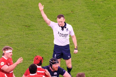 210226 - Wales v Scotland - Guinness Six Nations - Referee Matthew Carley awards a penalty to Wales