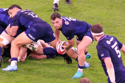 210226 - Wales v Scotland - Guinness Six Nations - Ben White of Scotland passes the ball