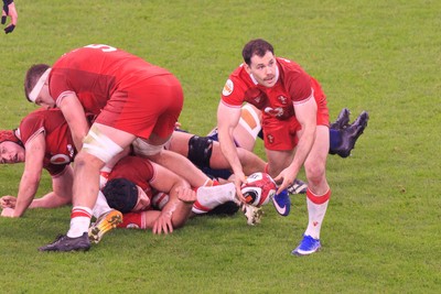 210226 - Wales v Scotland - Guinness Six Nations - Tomos Williams of Wales passes the ball