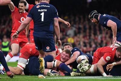 210226 - Wales v Scotland - Guinness Men's Six Nations - Rhys Carre of Wales scores the first try of the game