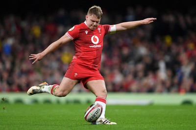 210226 - Wales v Scotland - Guinness Men's Six Nations - Sam Costelow of Wales kicks the conversion