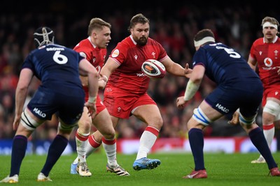 210226 - Wales v Scotland - Guinness Men's Six Nations - Tomas Francis of Wales is challenged by Scott Cummings of Scotland